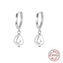 Elegant Silver Pearl Earrings: Timeless Luxury Accessory Elegant Silver Pearl Earrings: Timeless Luxury Accessory