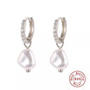 Elegant Silver Pearl Earrings: Timeless Luxury Accessory Elegant Silver Pearl Earrings: Timeless Luxury Accessory