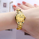 Sleek Women's Gold Quartz Watch with Day-Date Feature Design