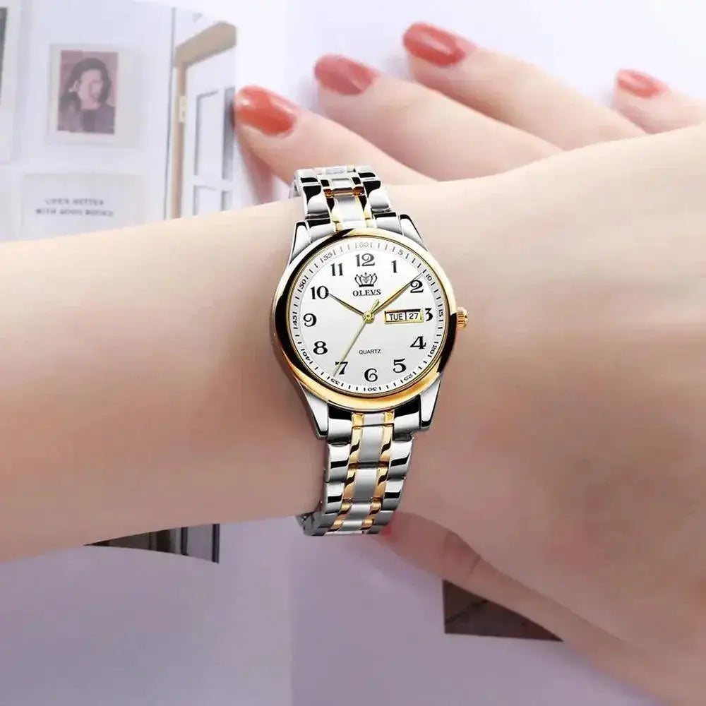 Elegant Gold Quartz Watch For Women With Day Date Feature