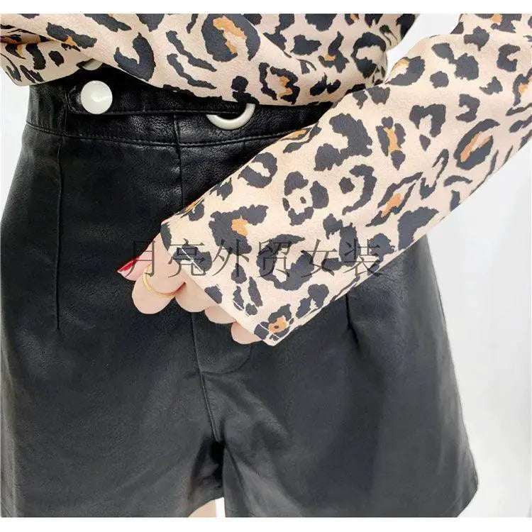 Leopard Print Cutout Top Exude Sophisticated Allure