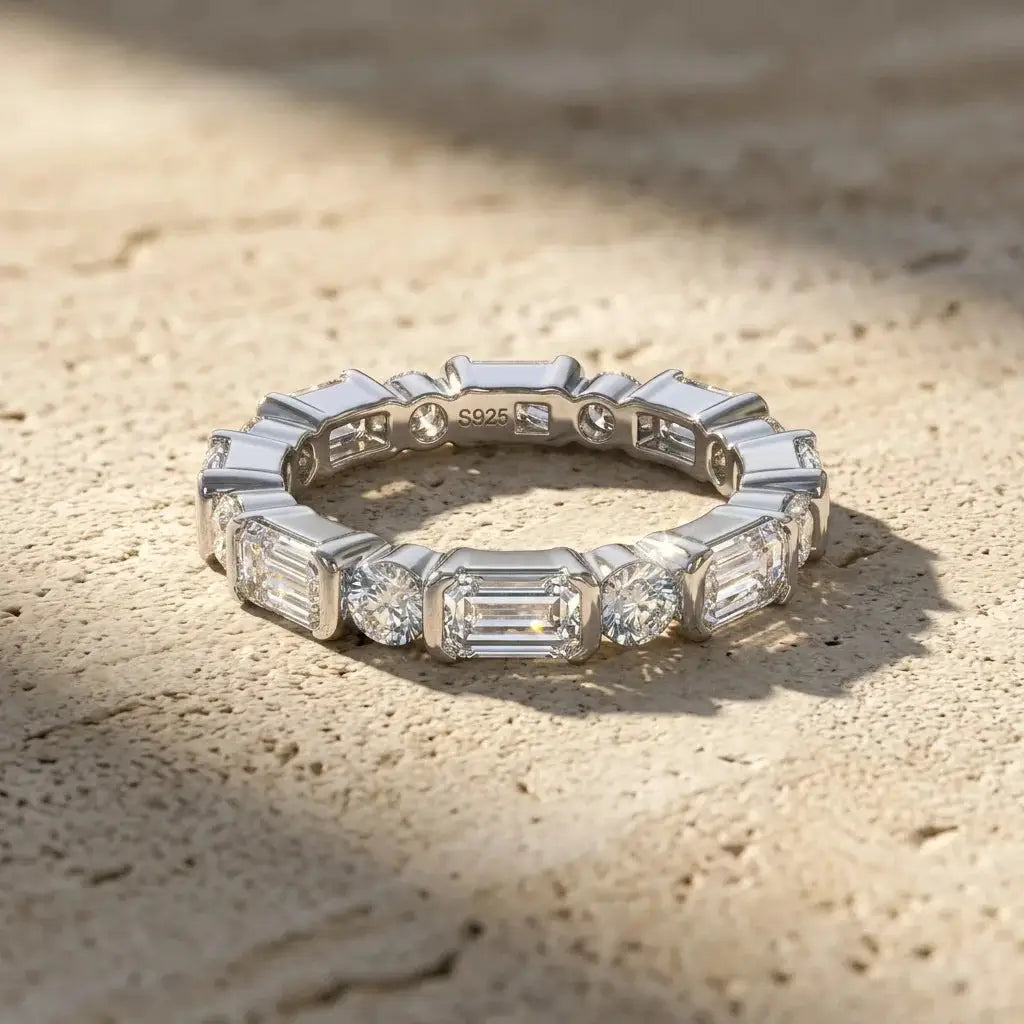 Emerald-style ring offered with moissanite and zircon stone labels