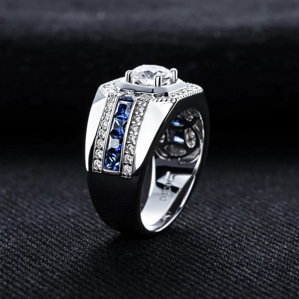 Square-profile statement ring described with a blue moissanite stone