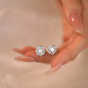 Flower Moissanite Stud Earrings in Sterling Silver