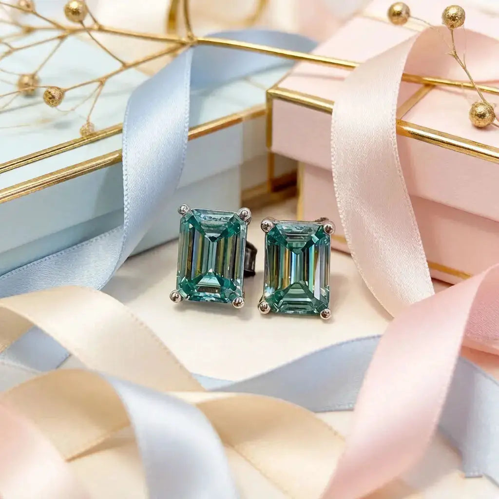 Green square moissanite stud earrings in a geometric setting