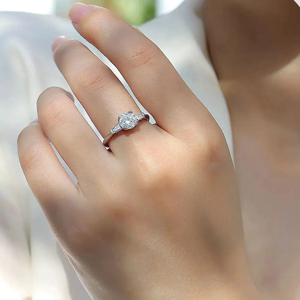 Sterling Silver Silver Moissanite Three Stone Ring — product image 1