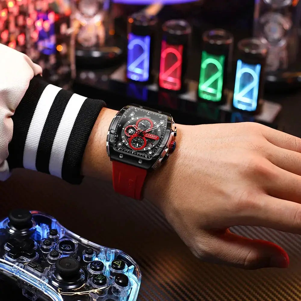 Modern sports watch with red strap on wrist, gaming controller and LED lights, OurLum.com