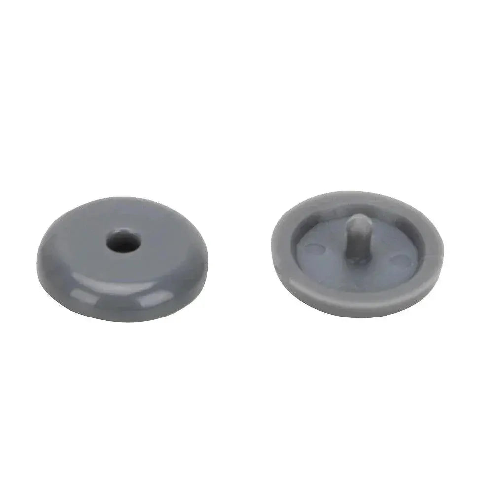 Two round grey plastic snap fasteners on white background, OurLum.com tech accessory