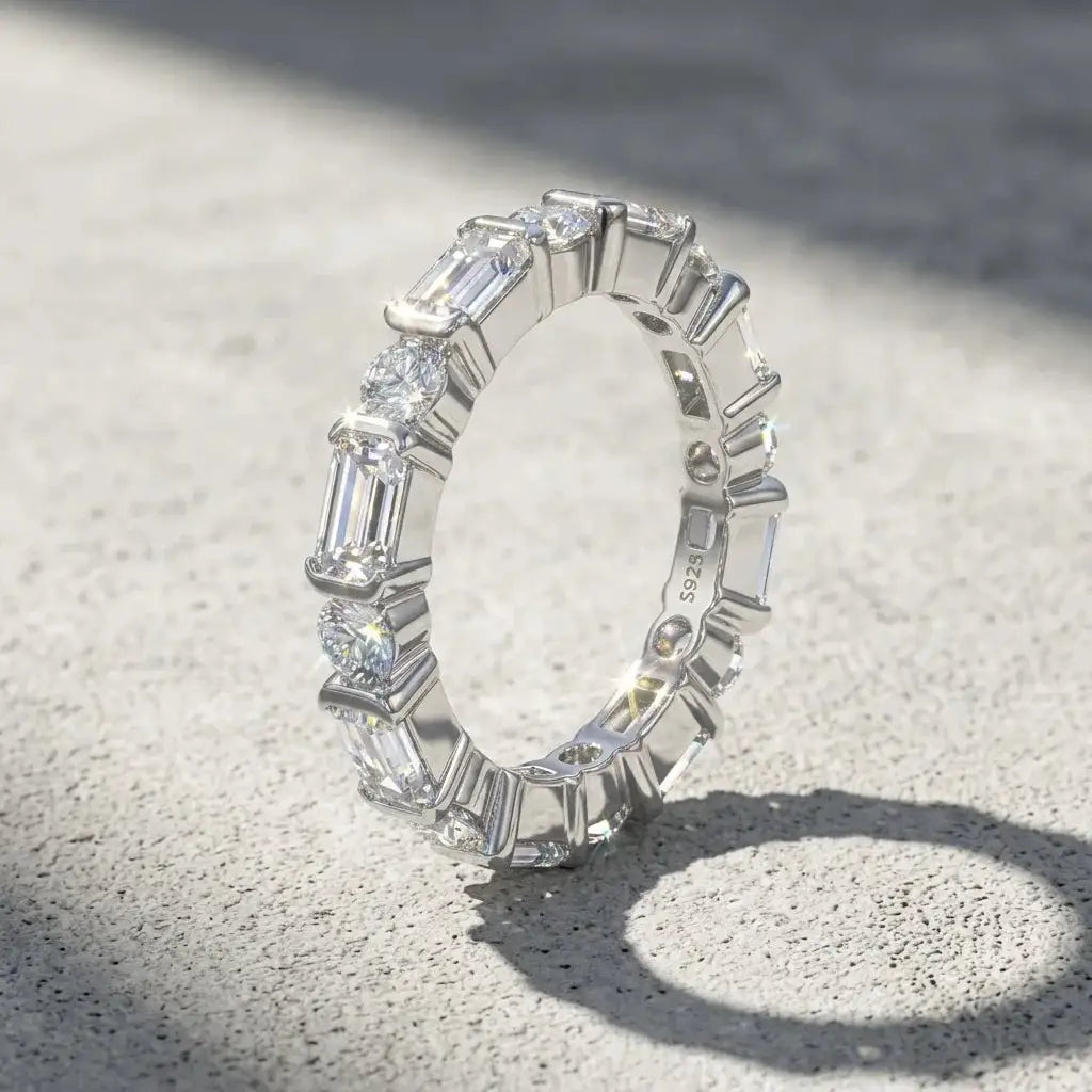 Emerald-style ring offered with moissanite and zircon stone labels