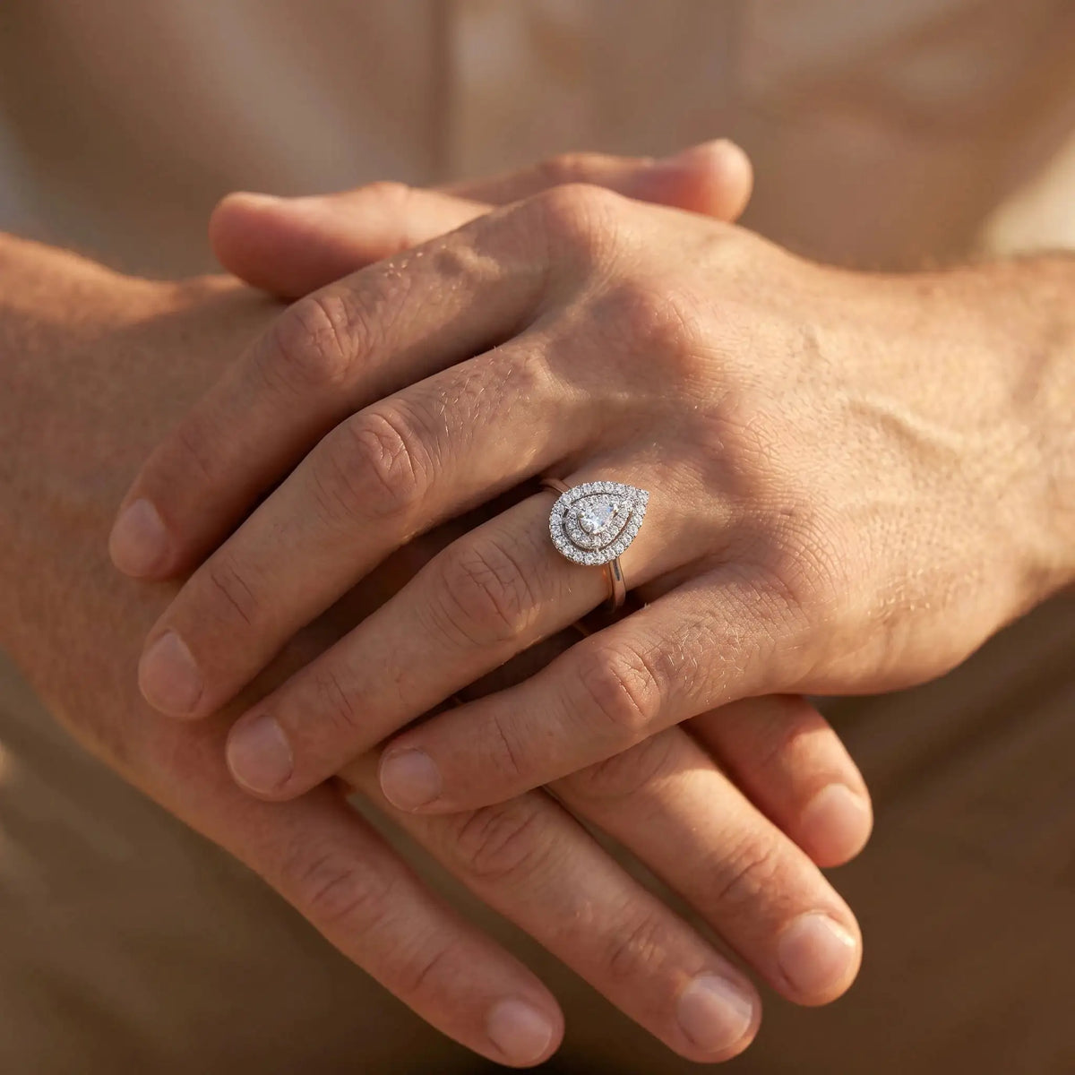Pear Moissanite Ring in Sterling Silver Halo — product view 4