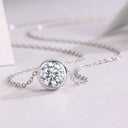 Round Cross Moissanite Pendant Necklace in Sterling Silver
