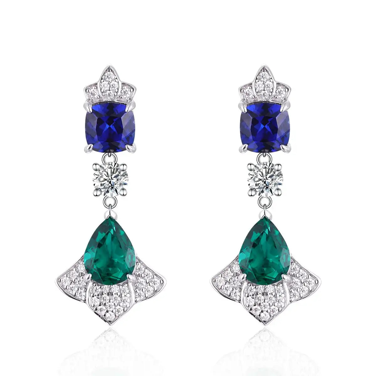 Cluster drop earrings described with sapphire and emerald accents