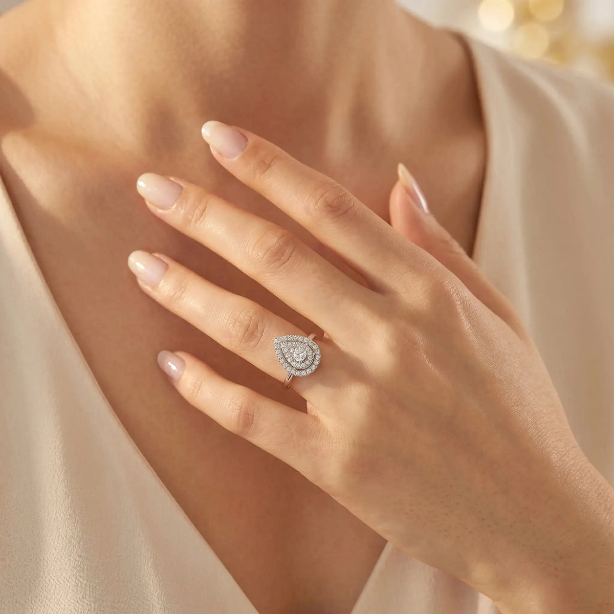 Pear Moissanite Ring in Sterling Silver Halo — product view 5