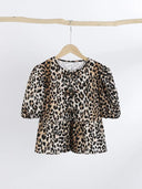 Leopard Print Bow Blouse Chic Statement Piece for Women