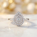 Pear Moissanite Ring In Halo