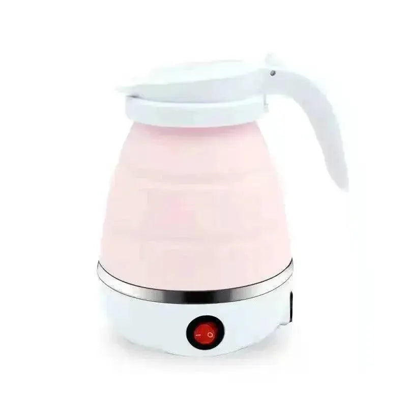 Pink collapsible electric kettle with white handle, compact travel tech on white background