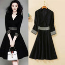 Autumn Elegance: Embroidered Black Dress with V Neckline