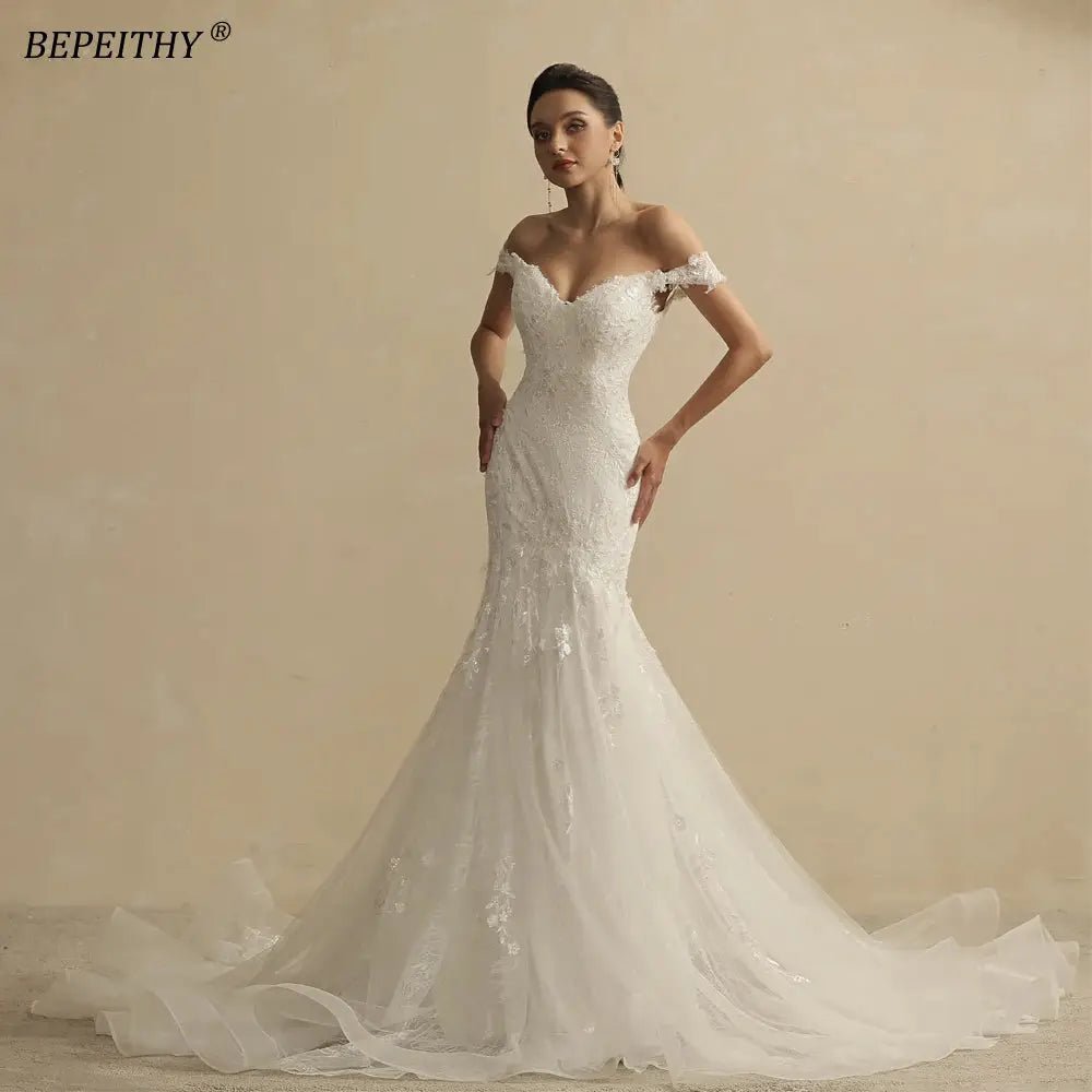 BEPEITHY Ivory Glitter Princess Wedding Dress With Lace Up Back Sleeveless Glam