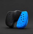 Black shoe with a blue insole on a dark background