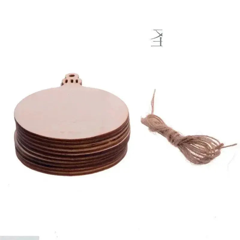 Stack of blank wooden discs with holes and twine for crafts or Christmas ornaments, OurLum.com