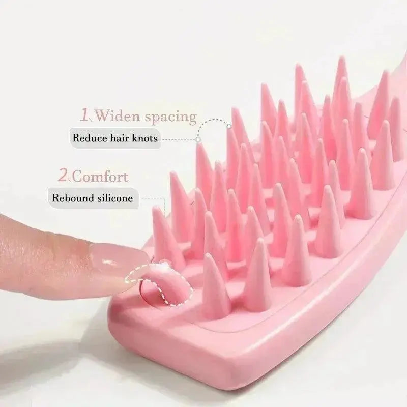 Dark pink silicone scalp massager brush with wide bristles and flexible tips for hair care
