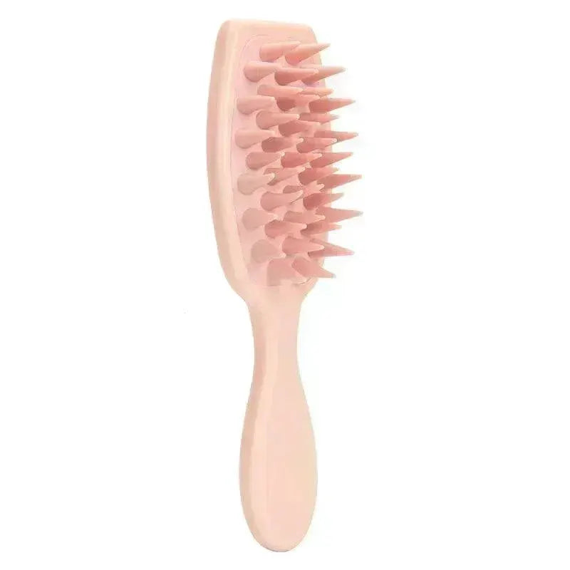Dark pink silicone scalp massaging brush with ergonomic handle and flexible bristles