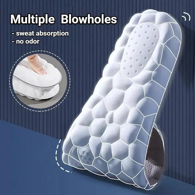 Grey 4D massage insole with honeycomb cushion design, arch support, and multiple ventilation holes.