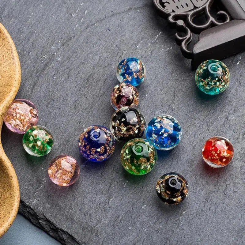 Handmade luminous glass lampwork beads in assorted colors for DIY jewelry crafts, OurLum.com
