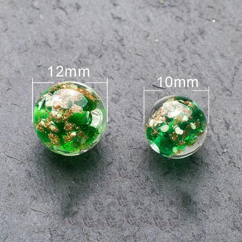 Green and gold luminous lampwork glass beads, 12mm and 10mm, for jewelry making on OurLum.com