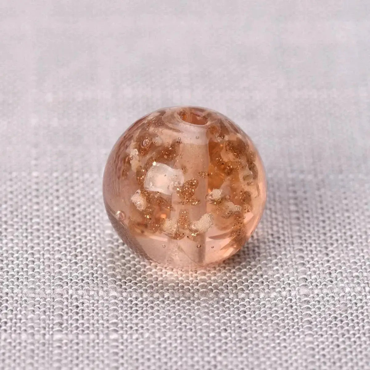 Handmade round luminous lampwork glass bead with gold flecks for jewelry making, OurLum.com