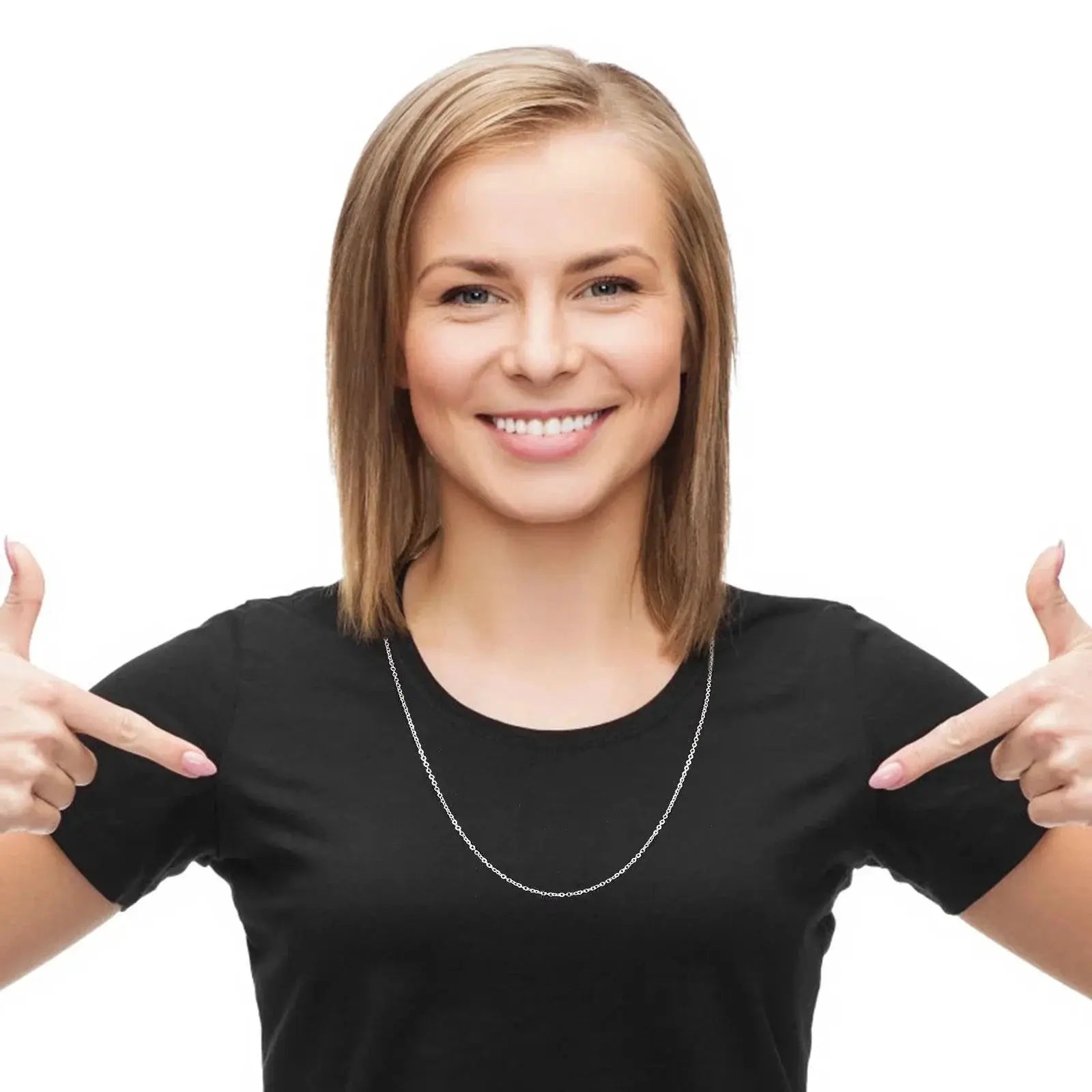 Woman wearing stainless steel link necklace chain, smiling, pointing at jewelry on OurLum.com