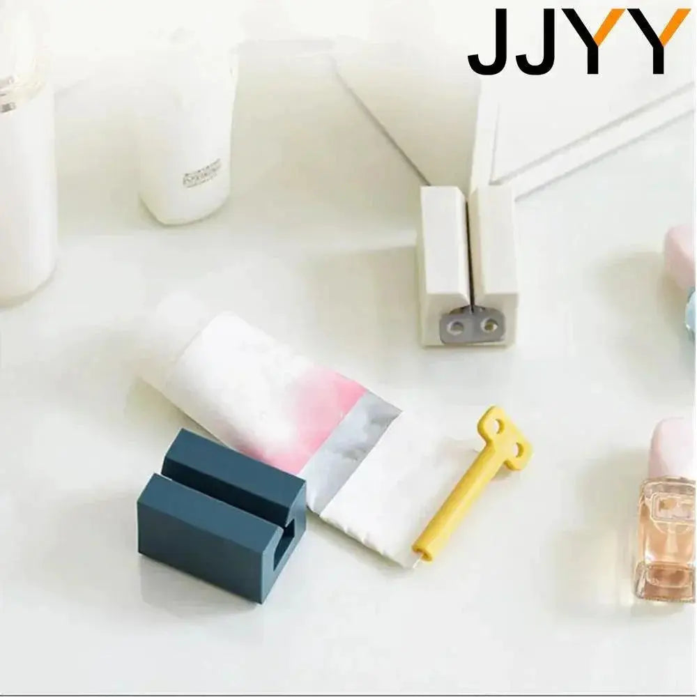 Plastic Toothpaste Tube Squeezer Rolling Dispenser Holder