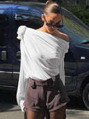 Slope Shoulder Blouse: Elegant Asymmetric Cropped Top Design