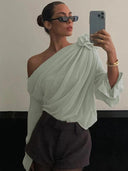 Slope Shoulder Blouse: Elegant Asymmetric Cropped Top Design