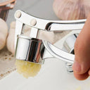 Two-In-One Garlic Press For Home Cooks